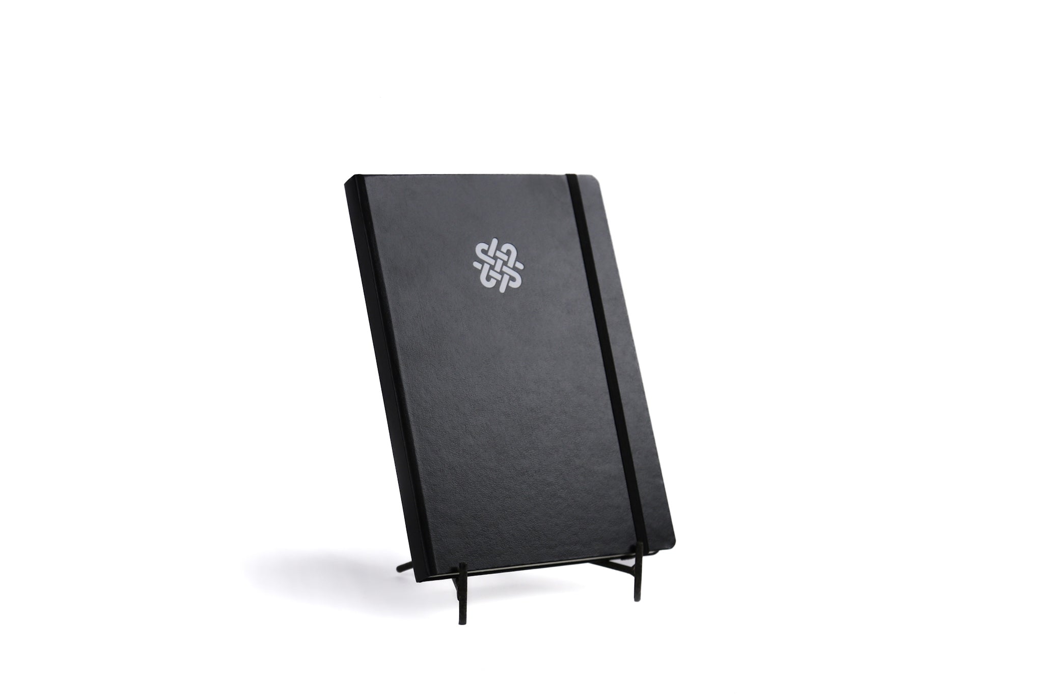 Black notebook with Shibari Study logo on a white background