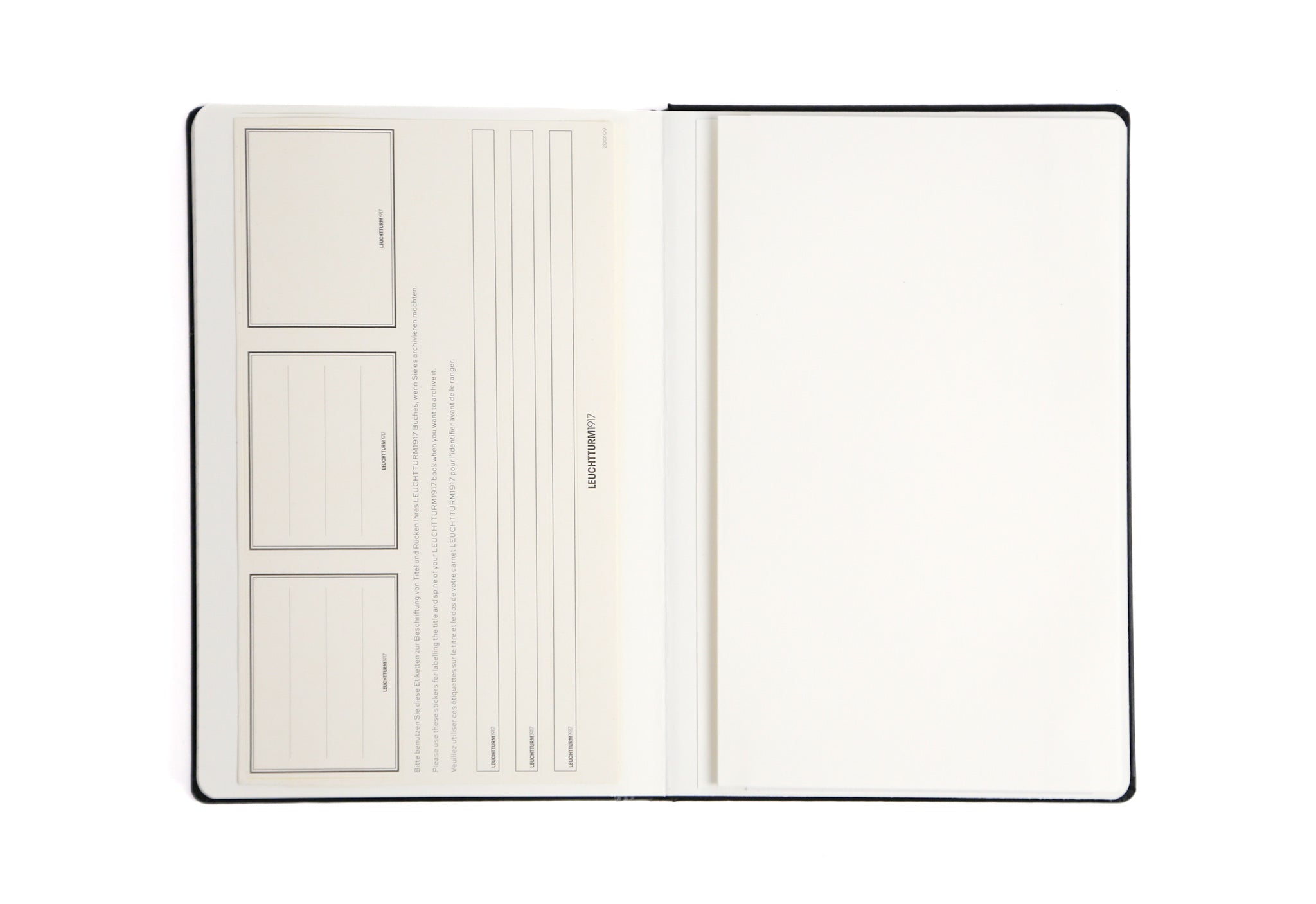 Open notebook with lined pages on a white background