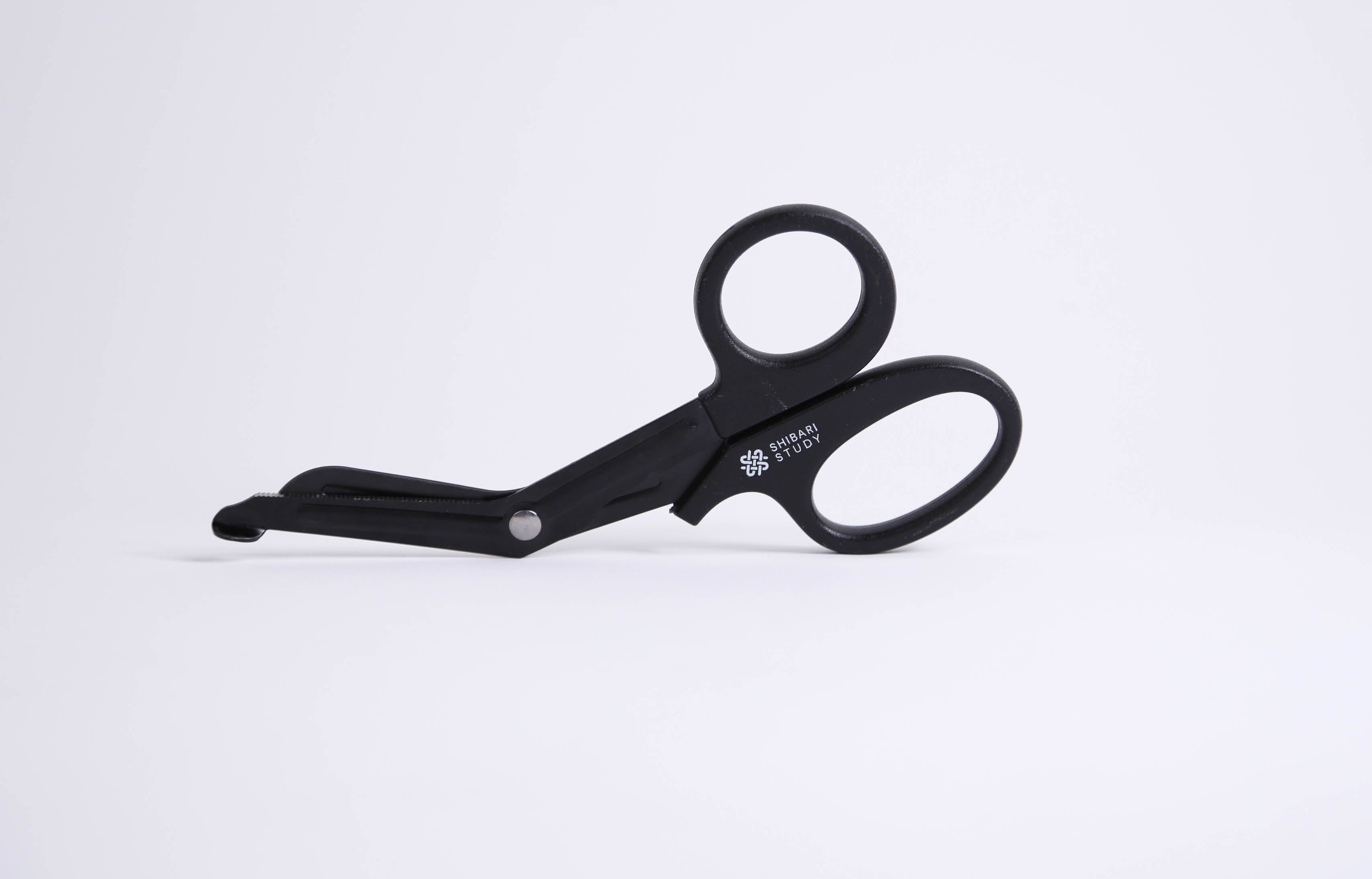 Black shears on a white background