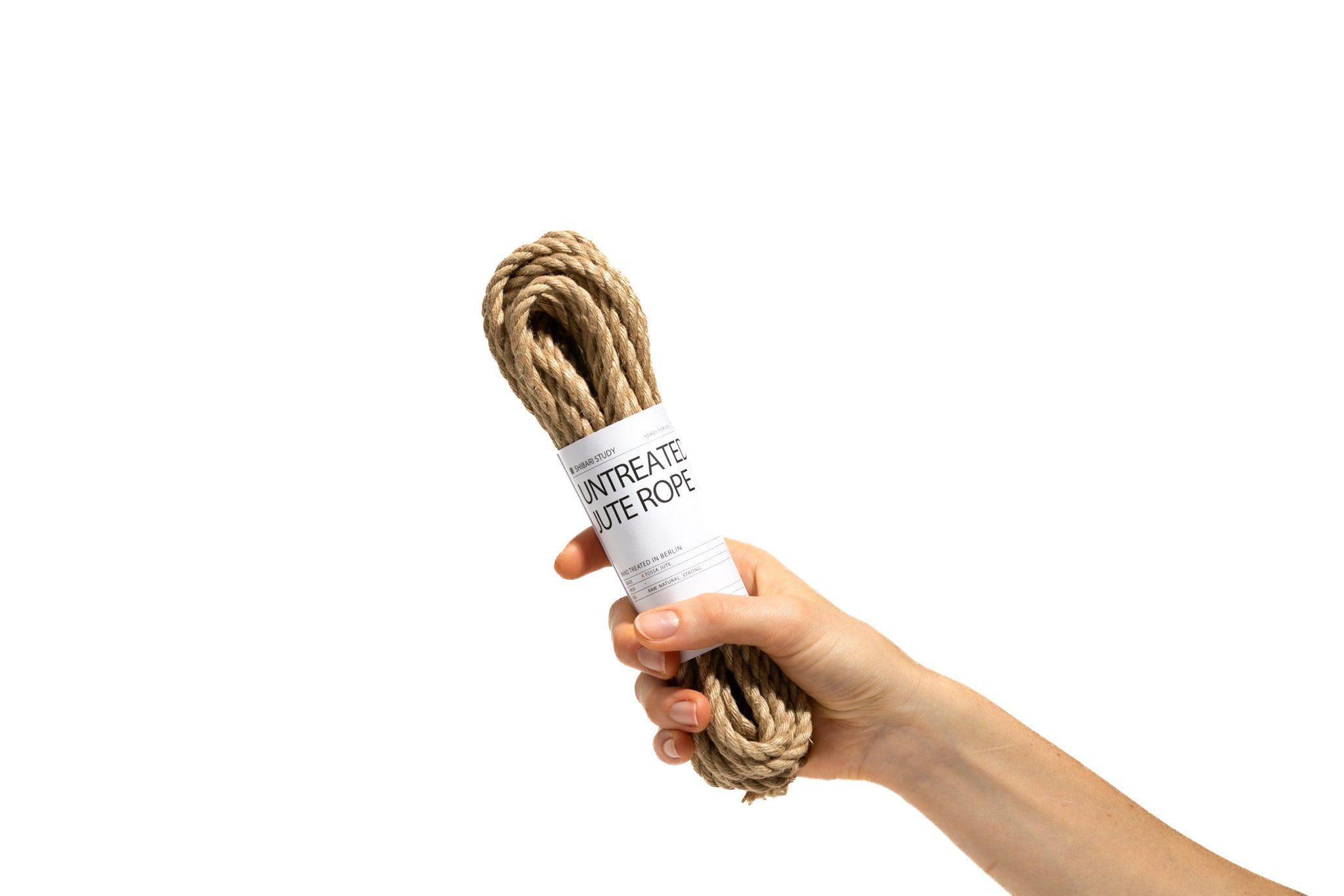Hand holding rope with a label on a white background