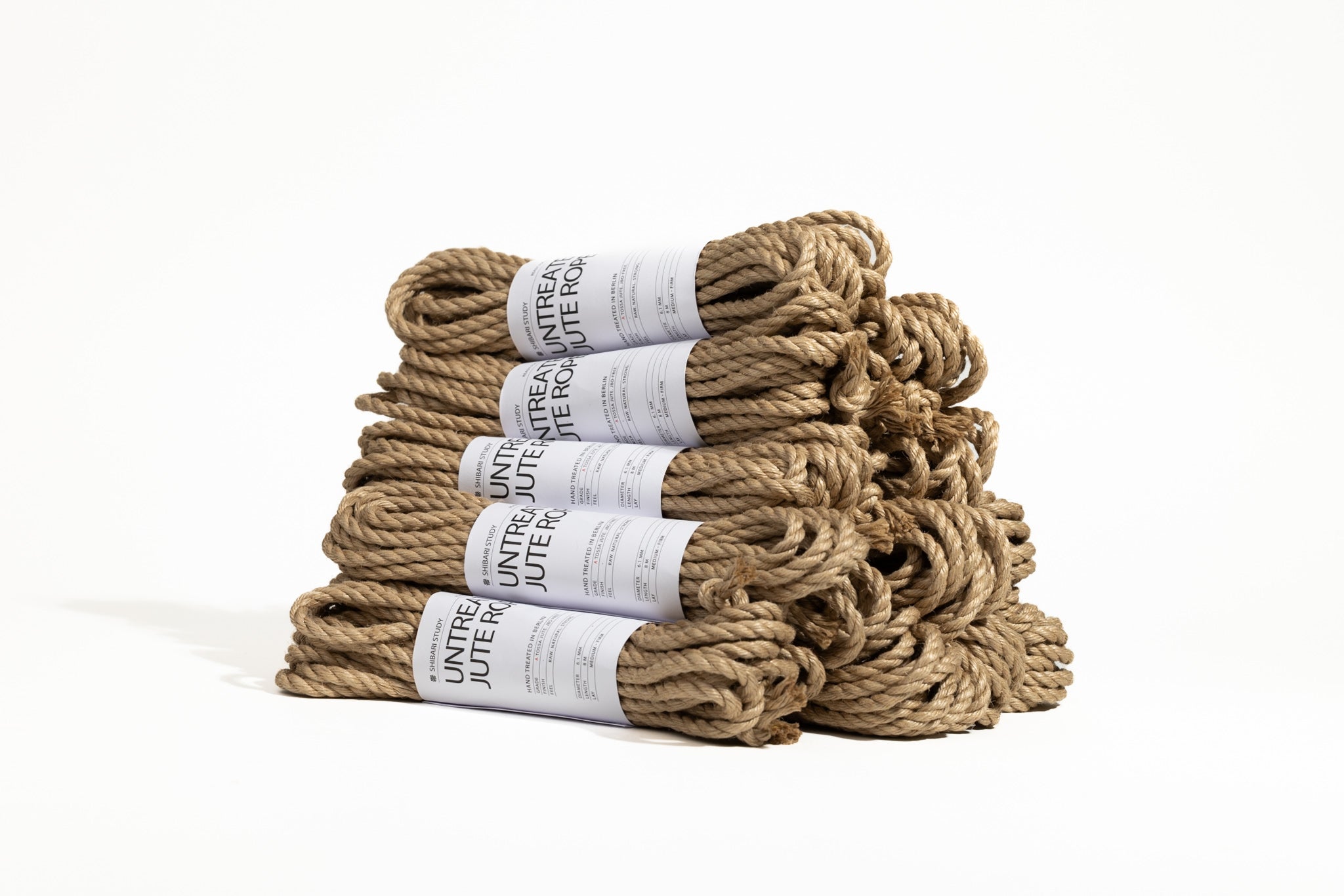 Stack of jute rope with visible branding on a white background