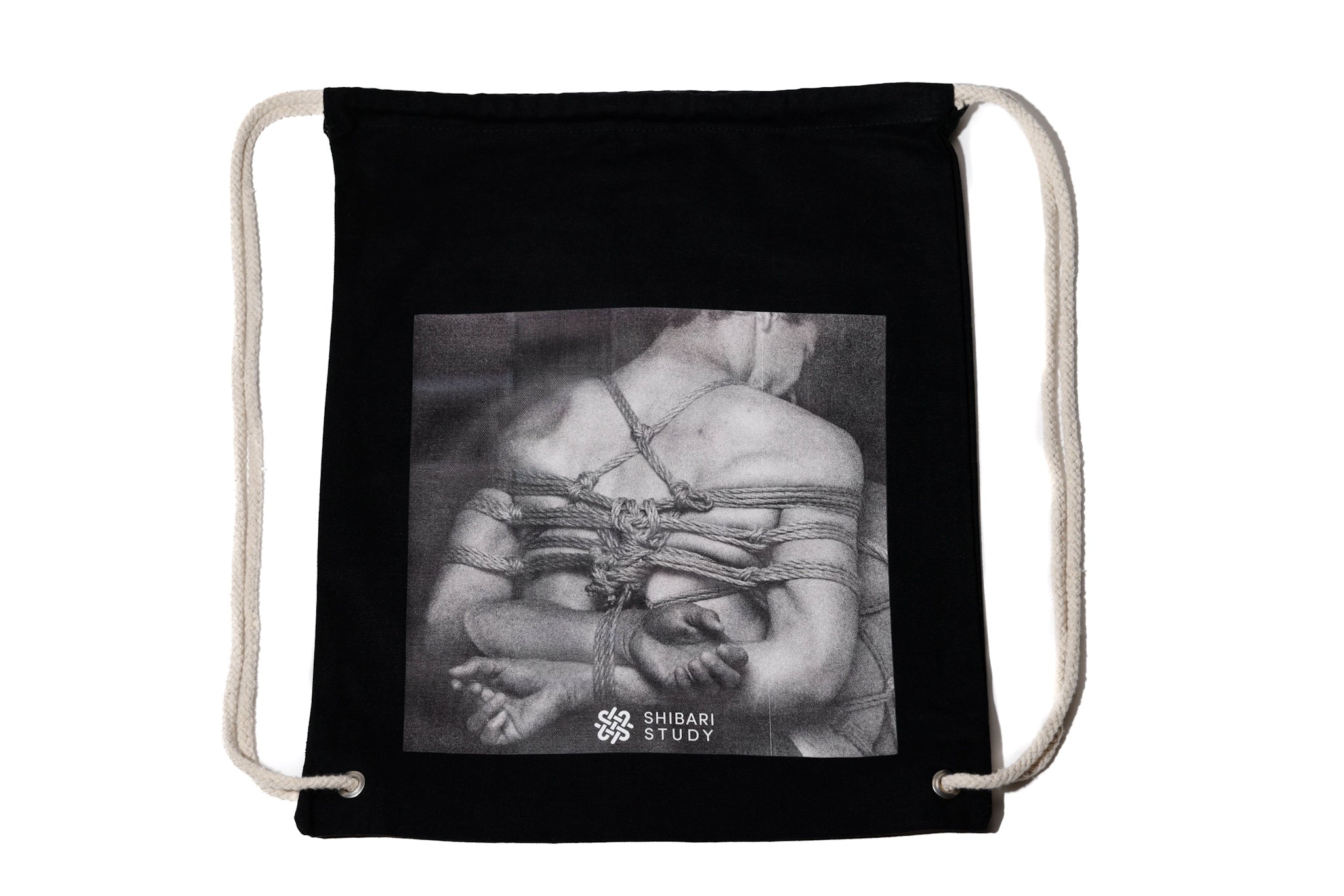 Black drawstring bag with a graphic design and 'Shibari Study' branding on a white background