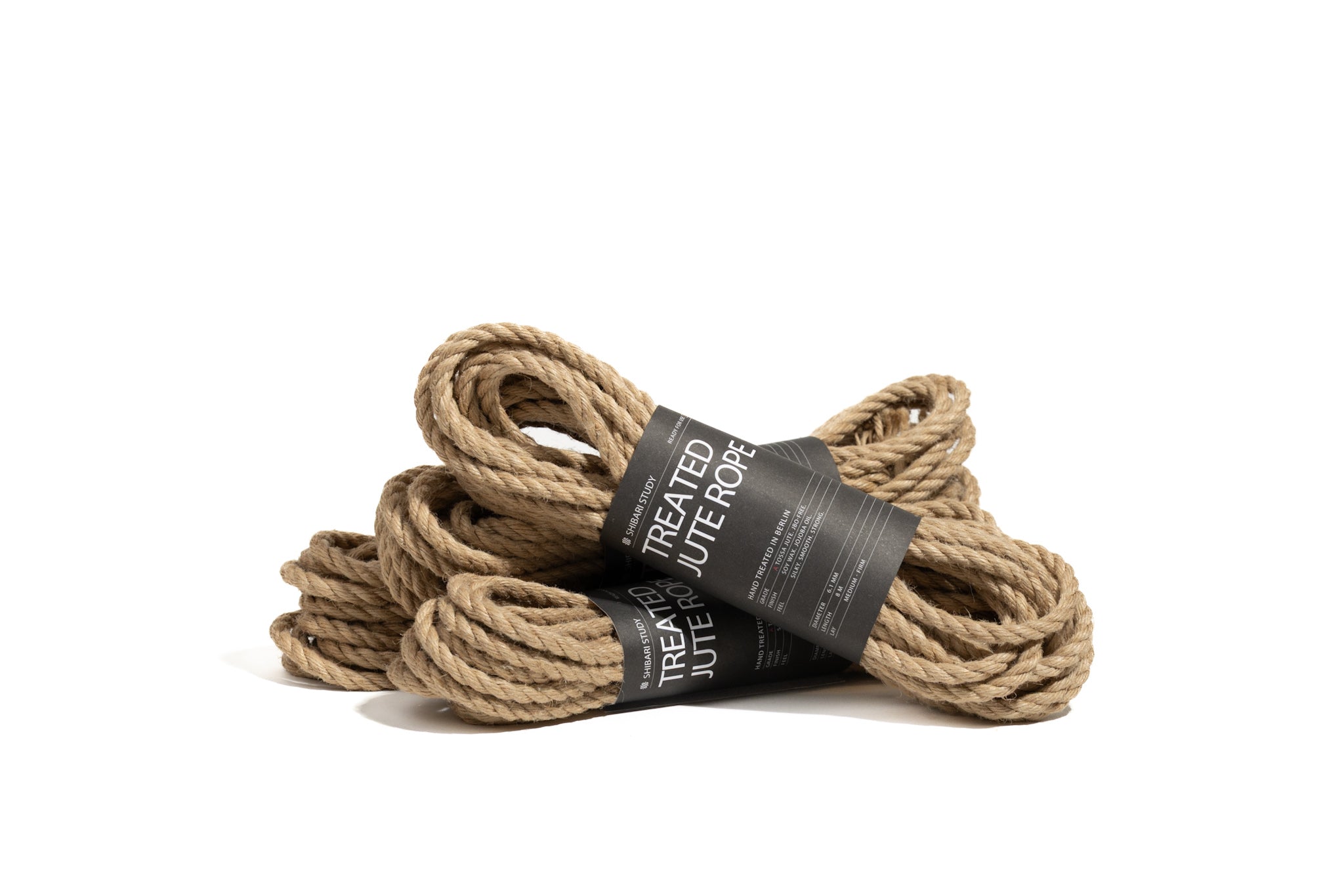 Coiled jute rope with a label on a white background